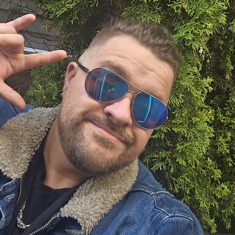 Jason Michaud, denim jacket, peace sign